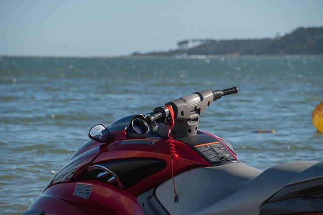 Person riding a personal watercraft on open water
